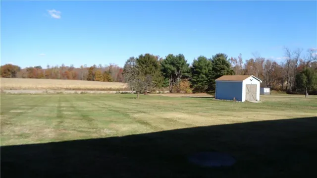 a view of a porch with a floor to ceiling window
