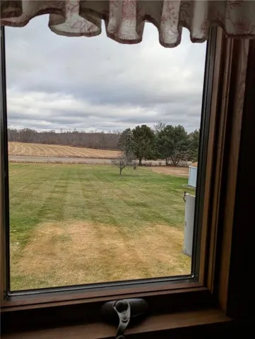 a view of a lake from a window