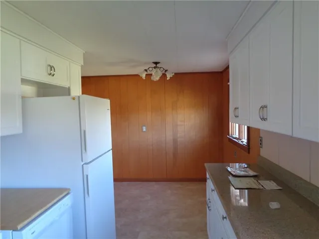 a bathroom with a glass door
