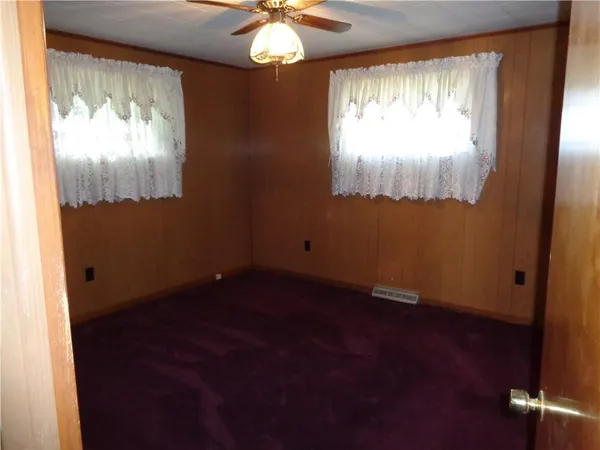 a bathroom with a glass door