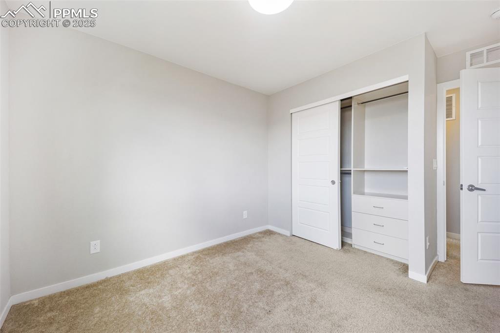 10934 Touchstone Loop Parker, CO 80134 - Photo 21 of 50 Bedroom 2