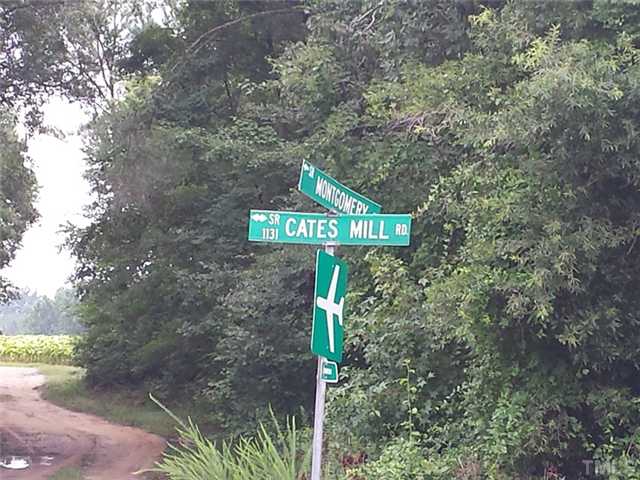 0 Cates Mill Road, Unit 1 Timberlake, NC 27583 - Photo 4 of 4 a street sign sitting on a wooden fence