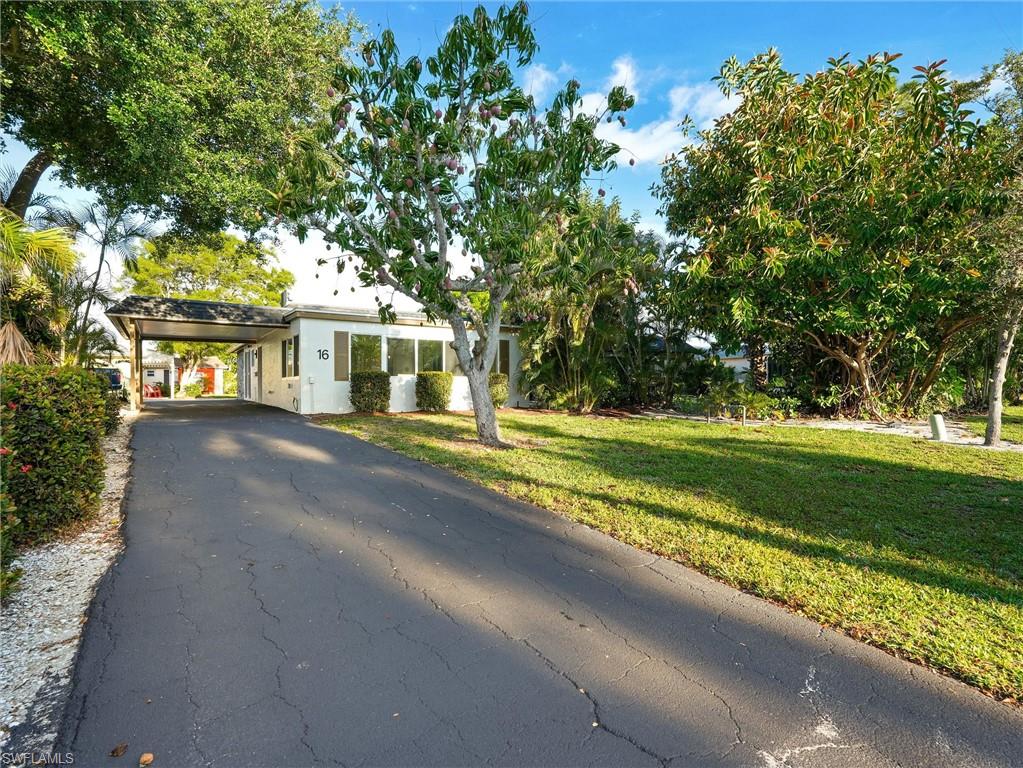 16 Kings Road, Unit A16 Naples, FL 34112 - Photo 1 of 34 Palm Street driveway entrance