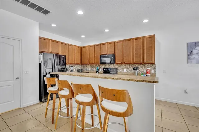 $555,000 | 5244 Oakbourne Avenue, Davenport, FL 33837