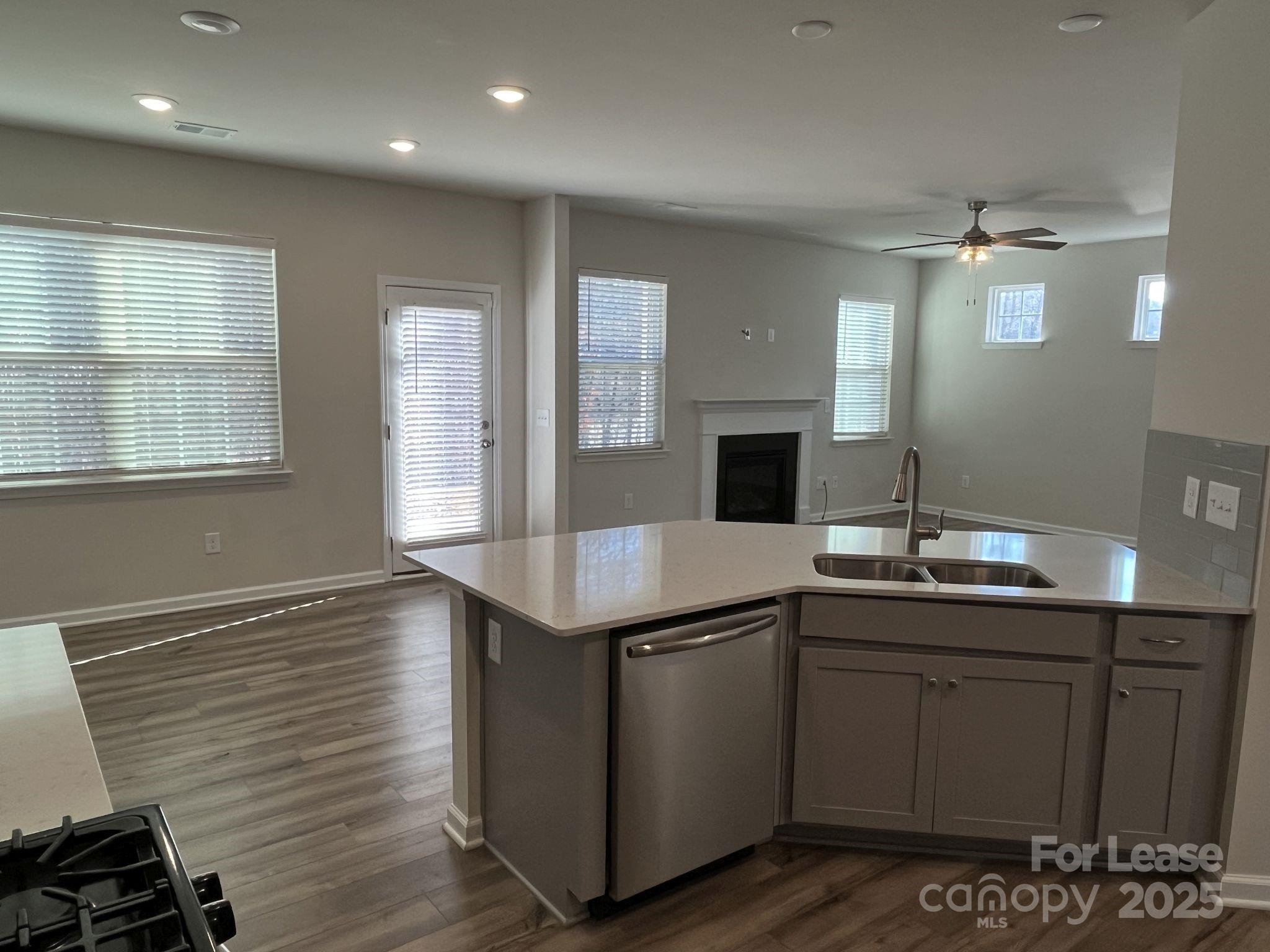 15529 Capps Road Charlotte, NC 28278 - Photo 11 of 27 a kitchen with a sink and cabinets