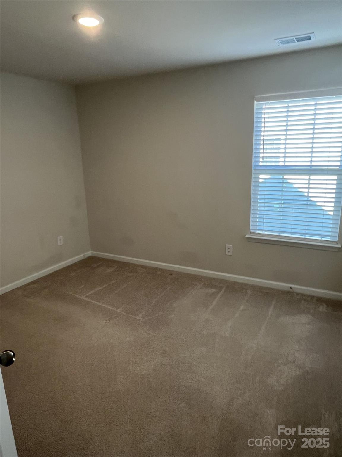 15529 Capps Road Charlotte, NC 28278 - Photo 19 of 27 an empty room with a window