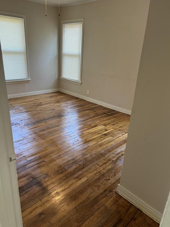 6318 Belgrade Avenue Dallas, TX 75227 - Photo 15 of 23 wooden floor in an empty room