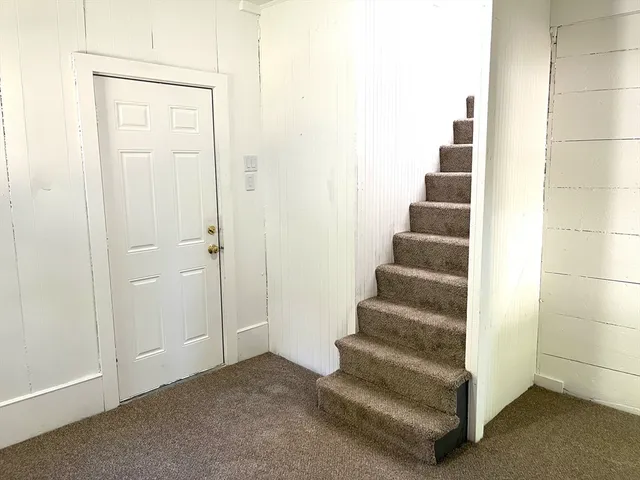 a view of entryway with white walls