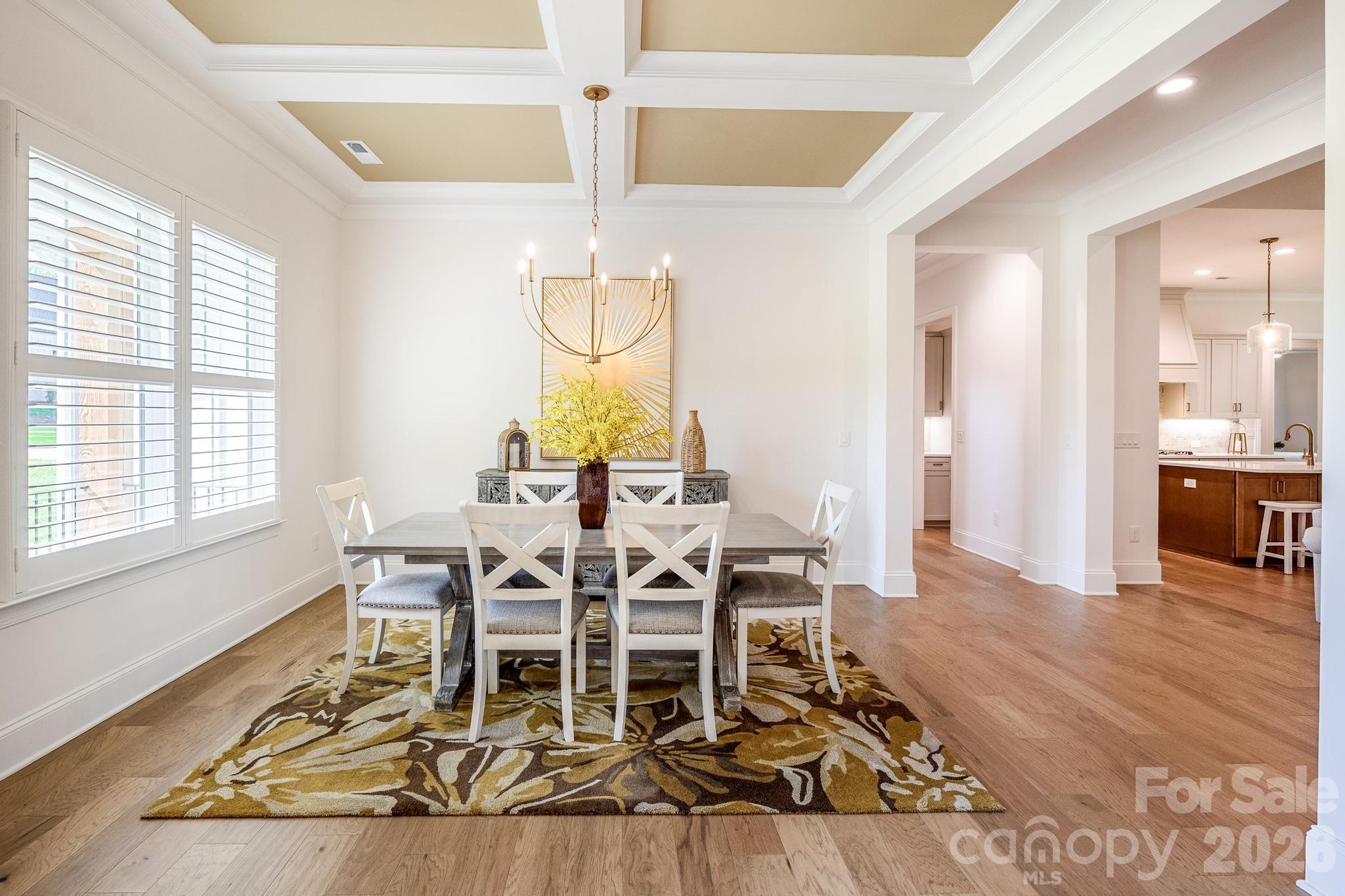 2411 Callaghan Court Landis, NC 28088 - Photo 17 of 48 a view of a dining room with furniture window and wooden floor
