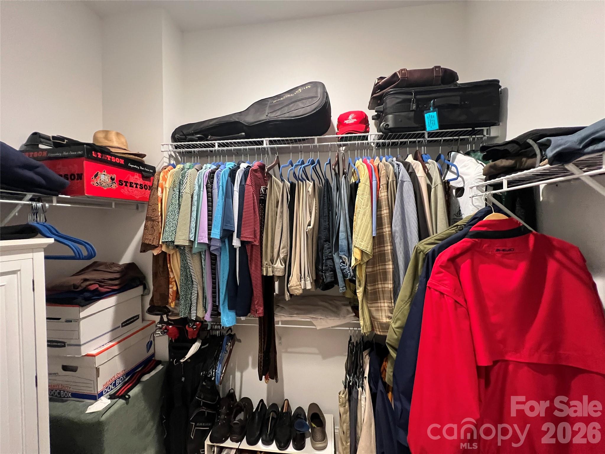 2411 Callaghan Court Landis, NC 28088 - Photo 31 of 48 a view of walk in closet with clothes and shoes