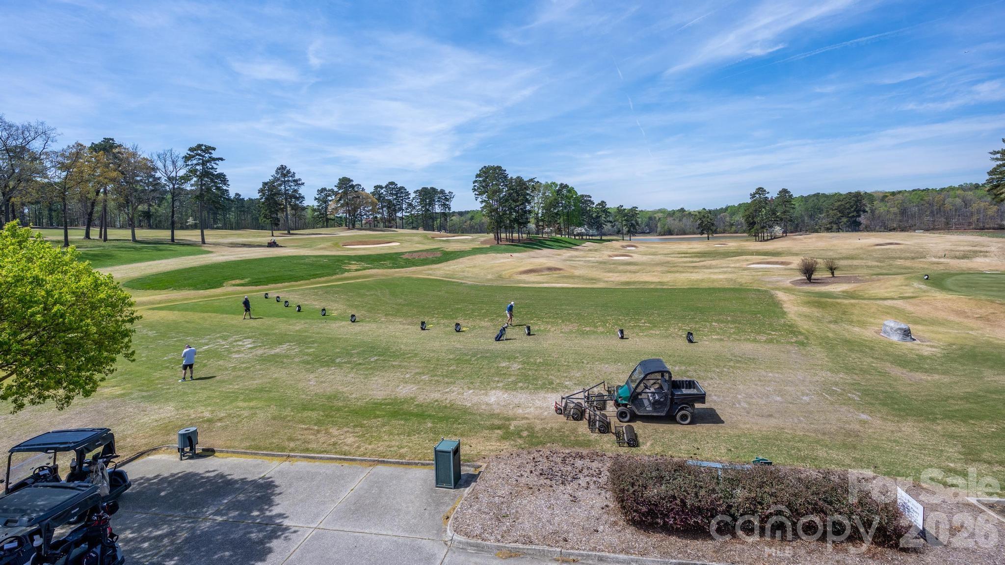 2411 Callaghan Court Landis, NC 28088 - Photo 35 of 48 a view of a lake with a big yard