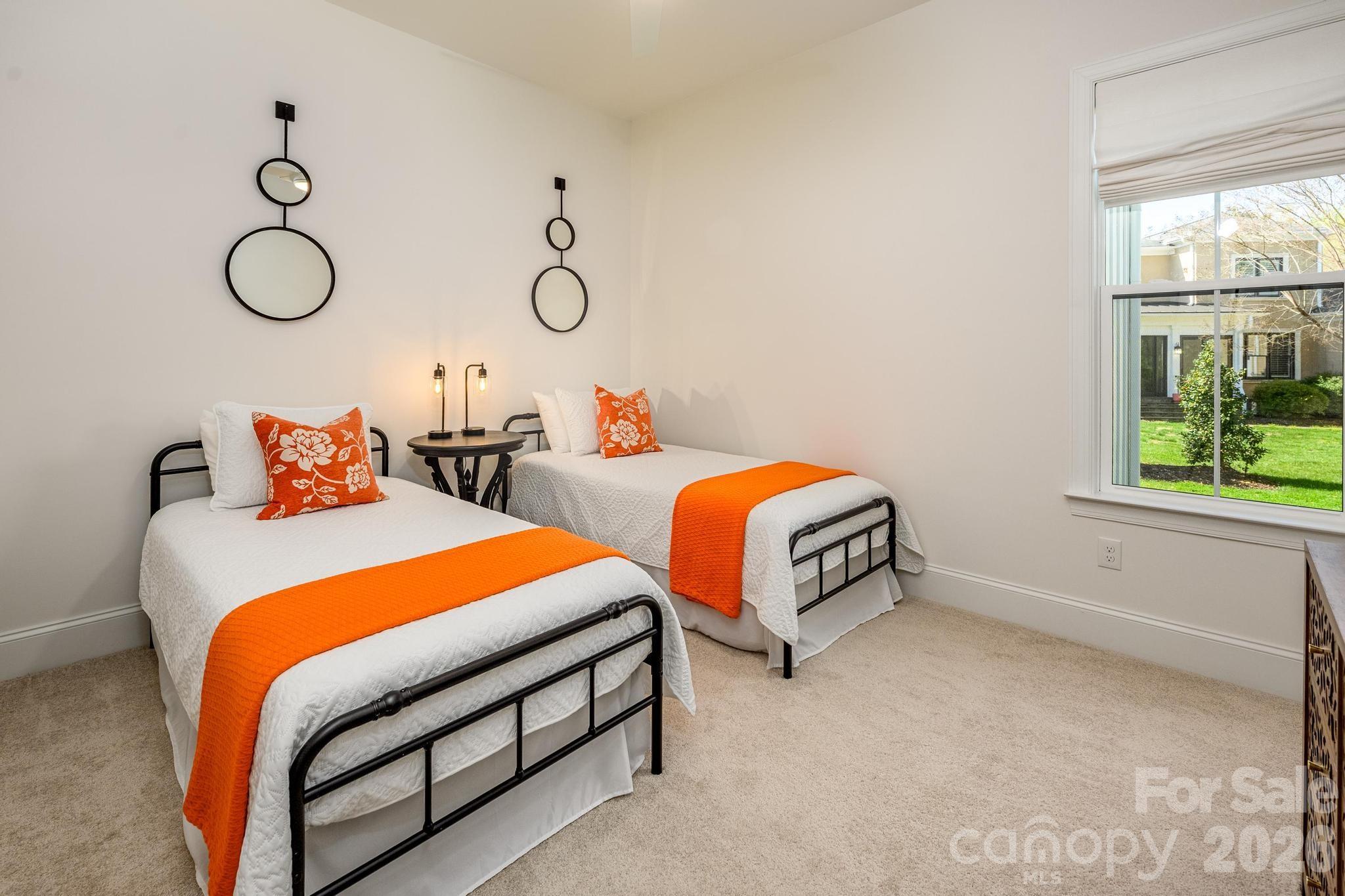 2411 Callaghan Court Landis, NC 28088 - Photo 39 of 48 a bedroom with two beds and a window