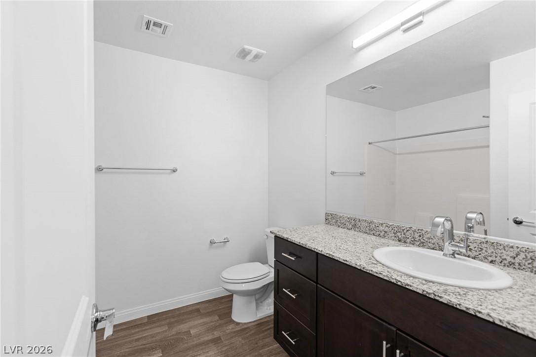 12367 Indigo Montage Road, Unit 3 Las Vegas, NV 89183 - Photo 18 of 33 This bathroom offers a large vanity with ample counter space and stylish fixtures.