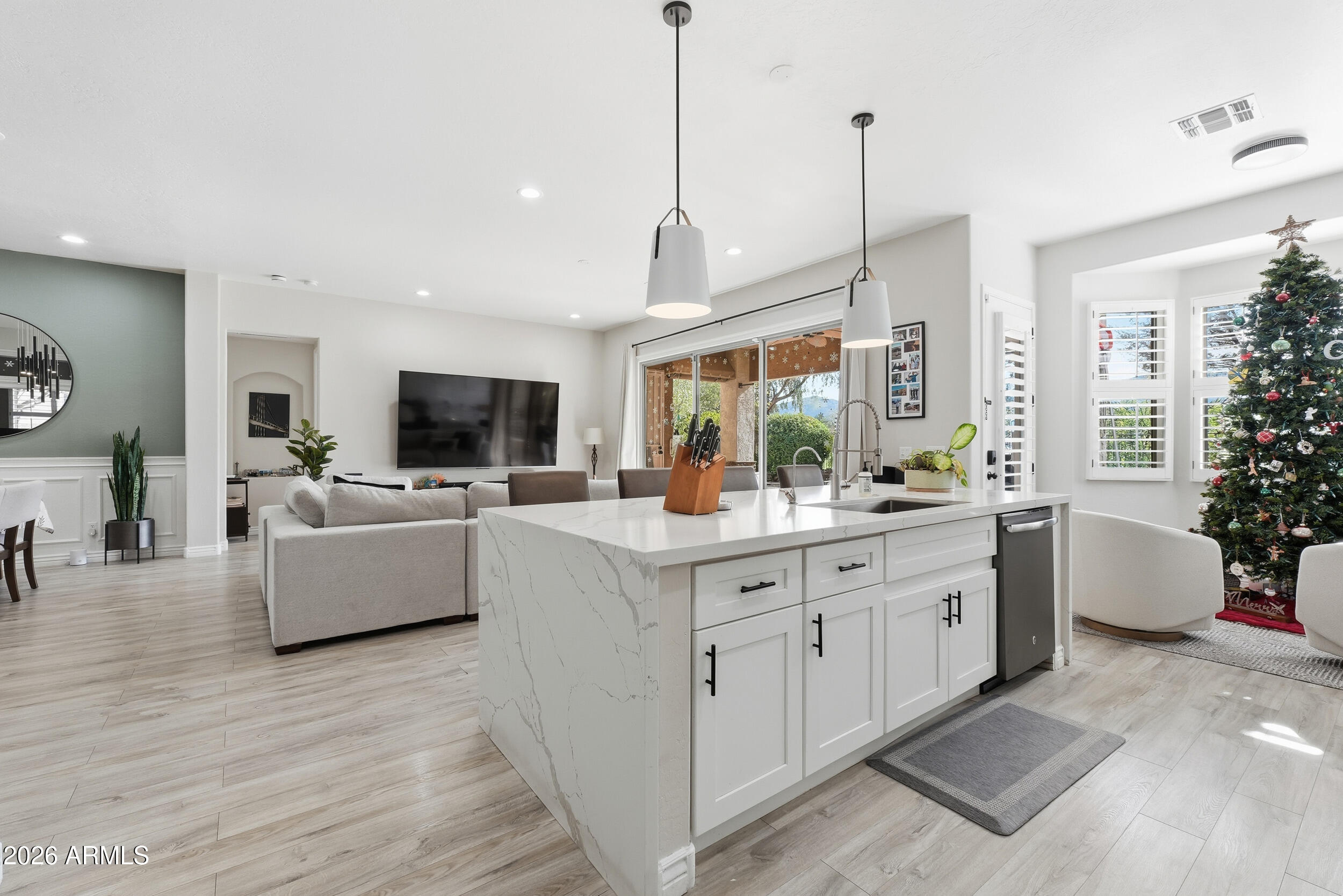 2633 East Fremont Road Phoenix, AZ 85042 - Photo 17 of 43 a living room with furniture and a flat screen tv
