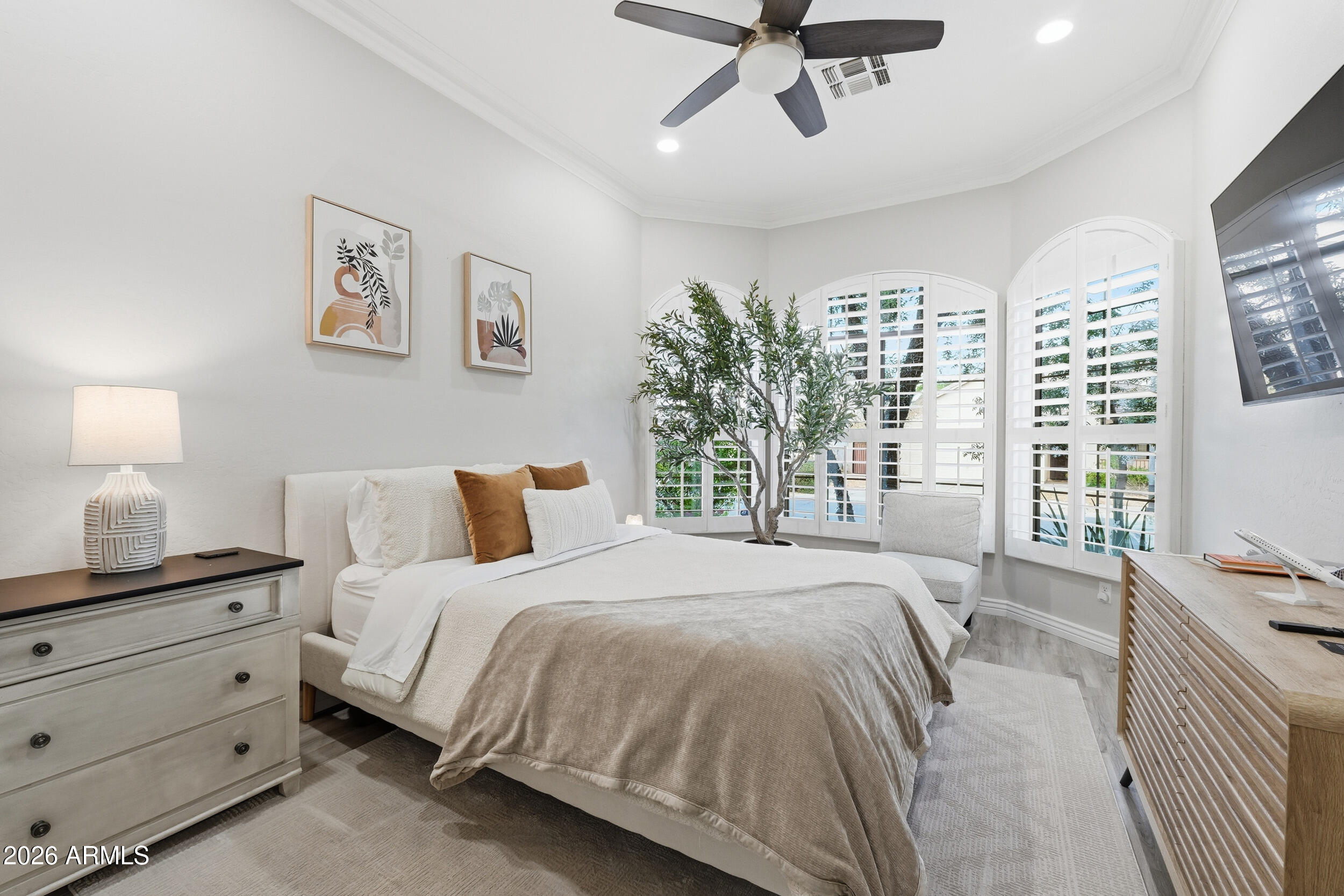 2633 East Fremont Road Phoenix, AZ 85042 - Photo 27 of 43 a bedroom with a bed and a window
