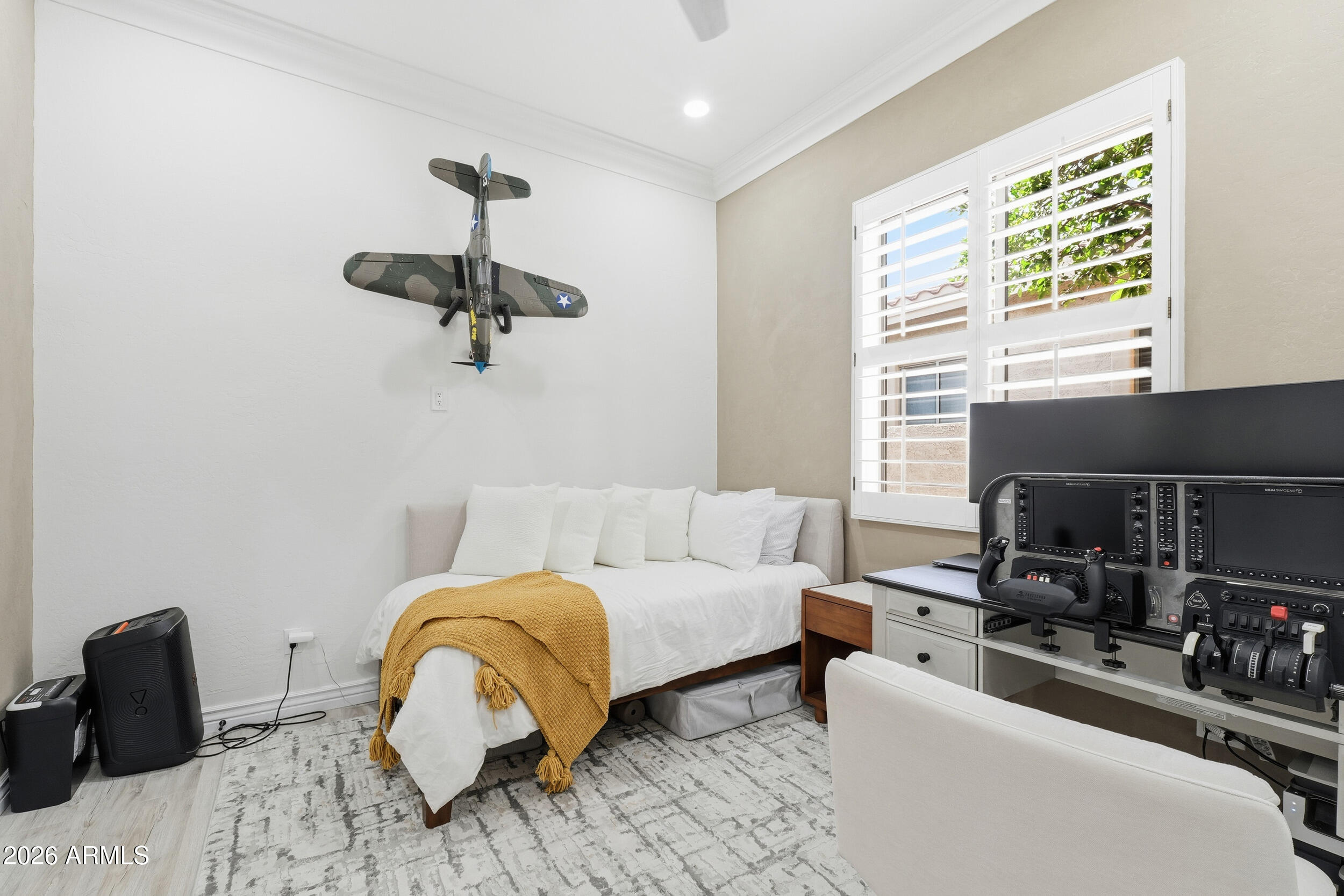 2633 East Fremont Road Phoenix, AZ 85042 - Photo 32 of 43 a living room with furniture and a fireplace