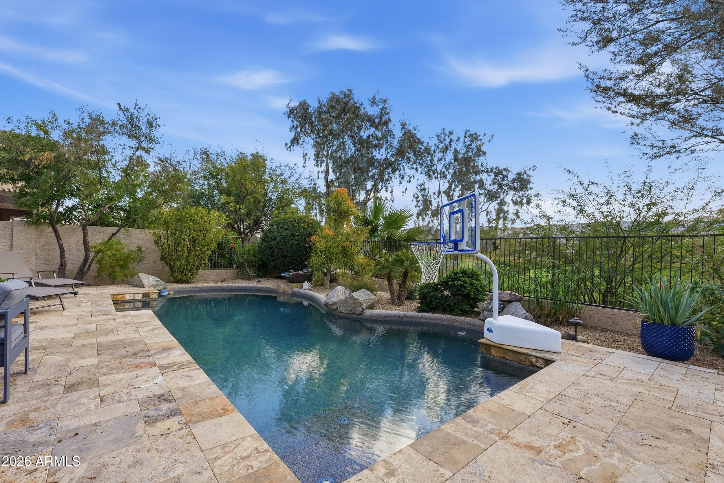 2633 East Fremont Road Phoenix, AZ 85042 - Photo 38 of 43 a view of a swimming pool with a patio and a yard