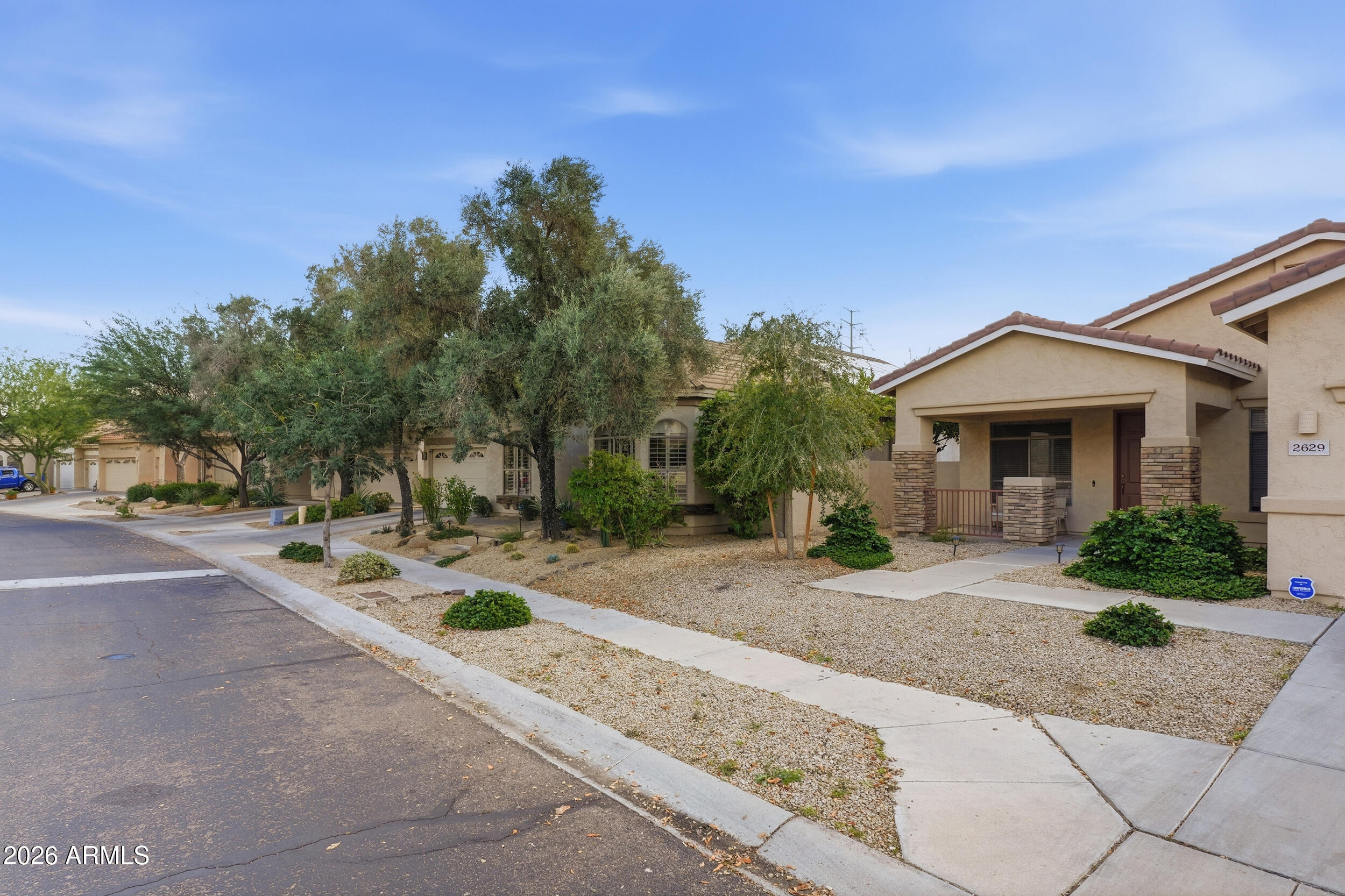 2633 East Fremont Road Phoenix, AZ 85042 - Photo 43 of 43 a front view of a house with yard and green space