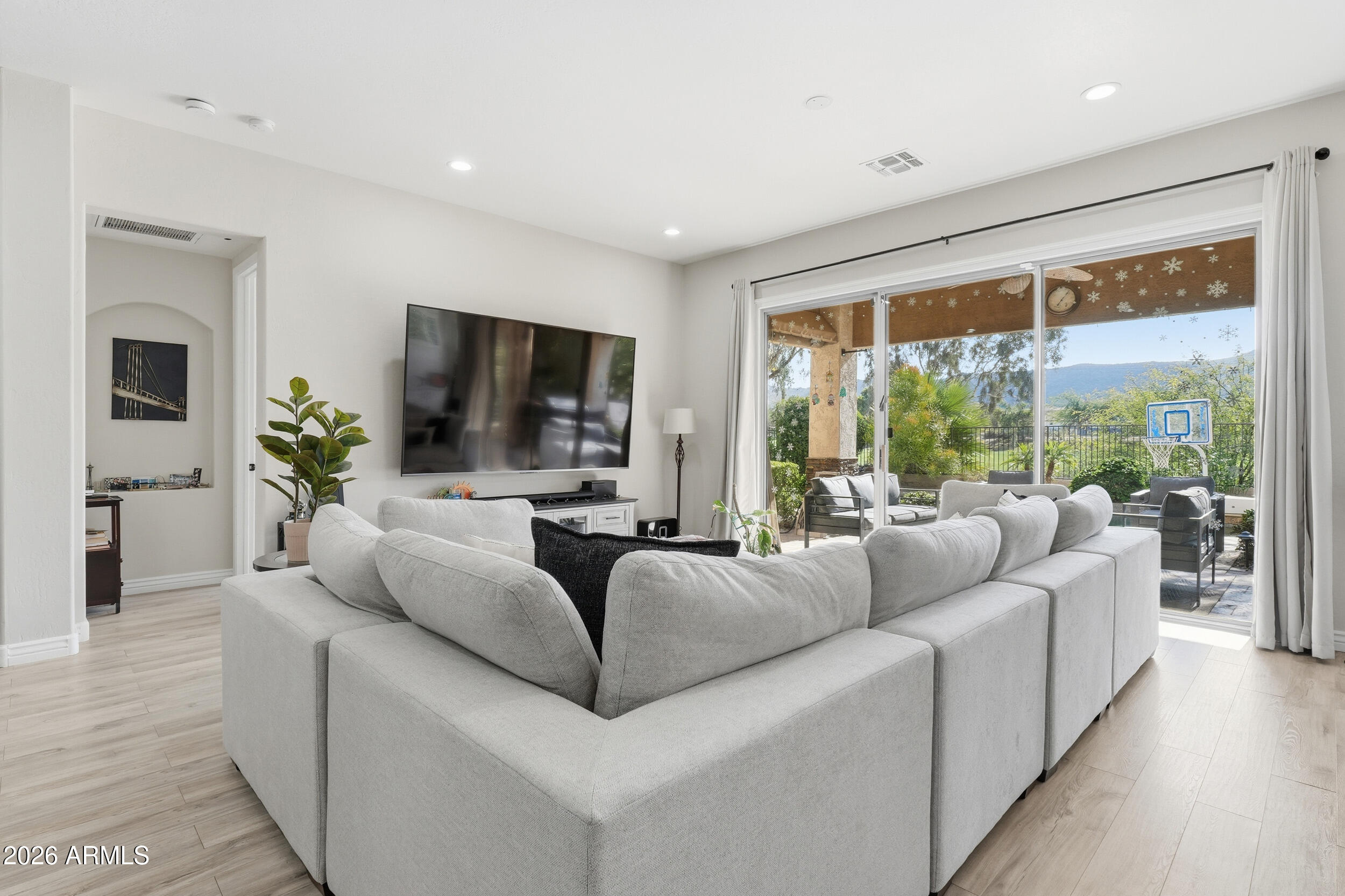 2633 East Fremont Road Phoenix, AZ 85042 - Photo 7 of 43 a living room with furniture and a flat screen tv