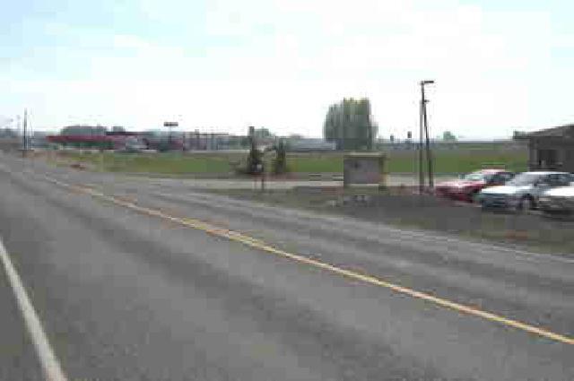 Nka Allen Road, Unit 3 Sunnyside, WA 98944 - Photo 5 of 6 a view of a road with a road sign on the side of the road