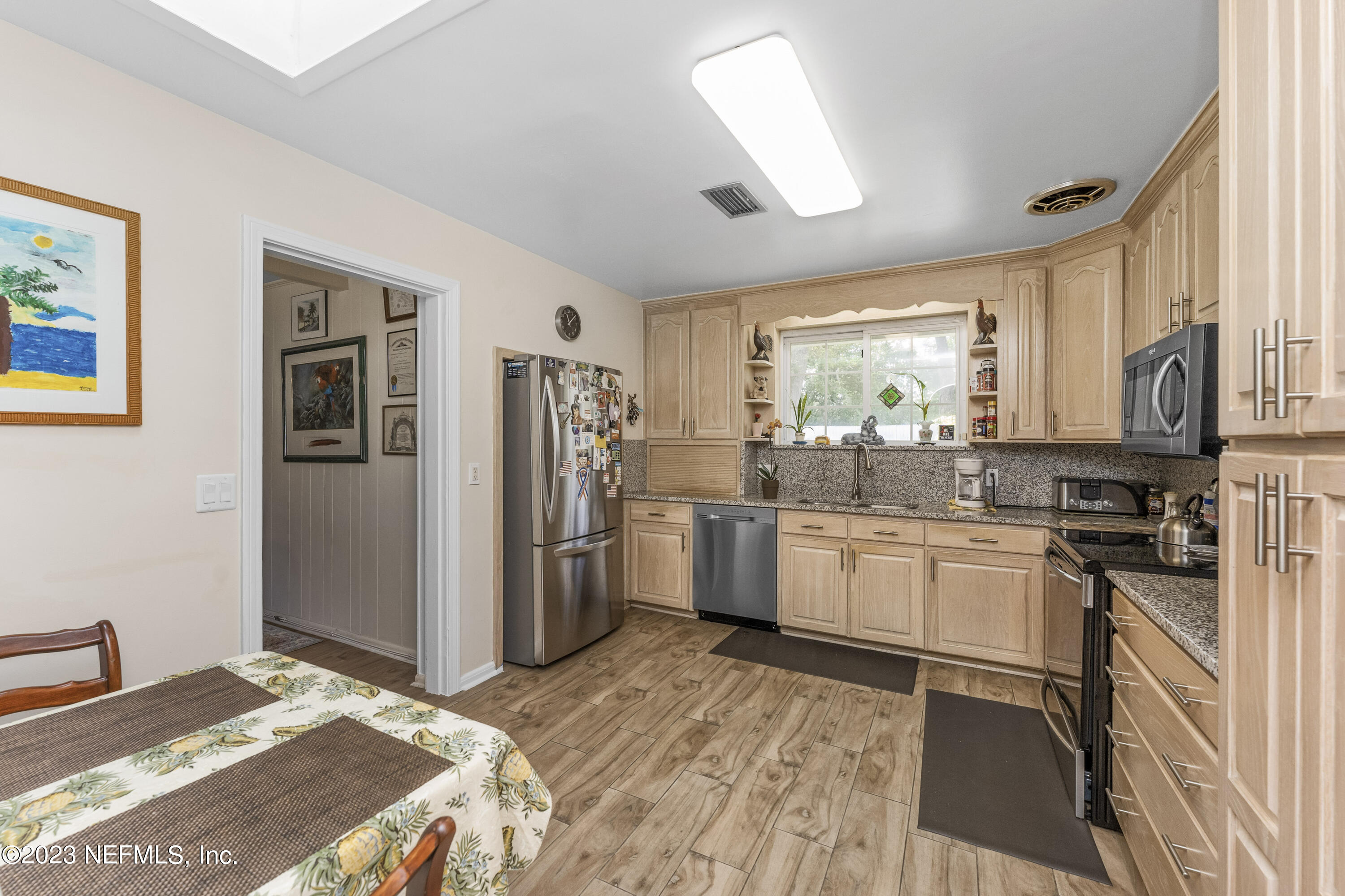 6204 Smallwood Road Jacksonville, FL 32216 - Photo 10 of 27 Luxury tile plank flooring