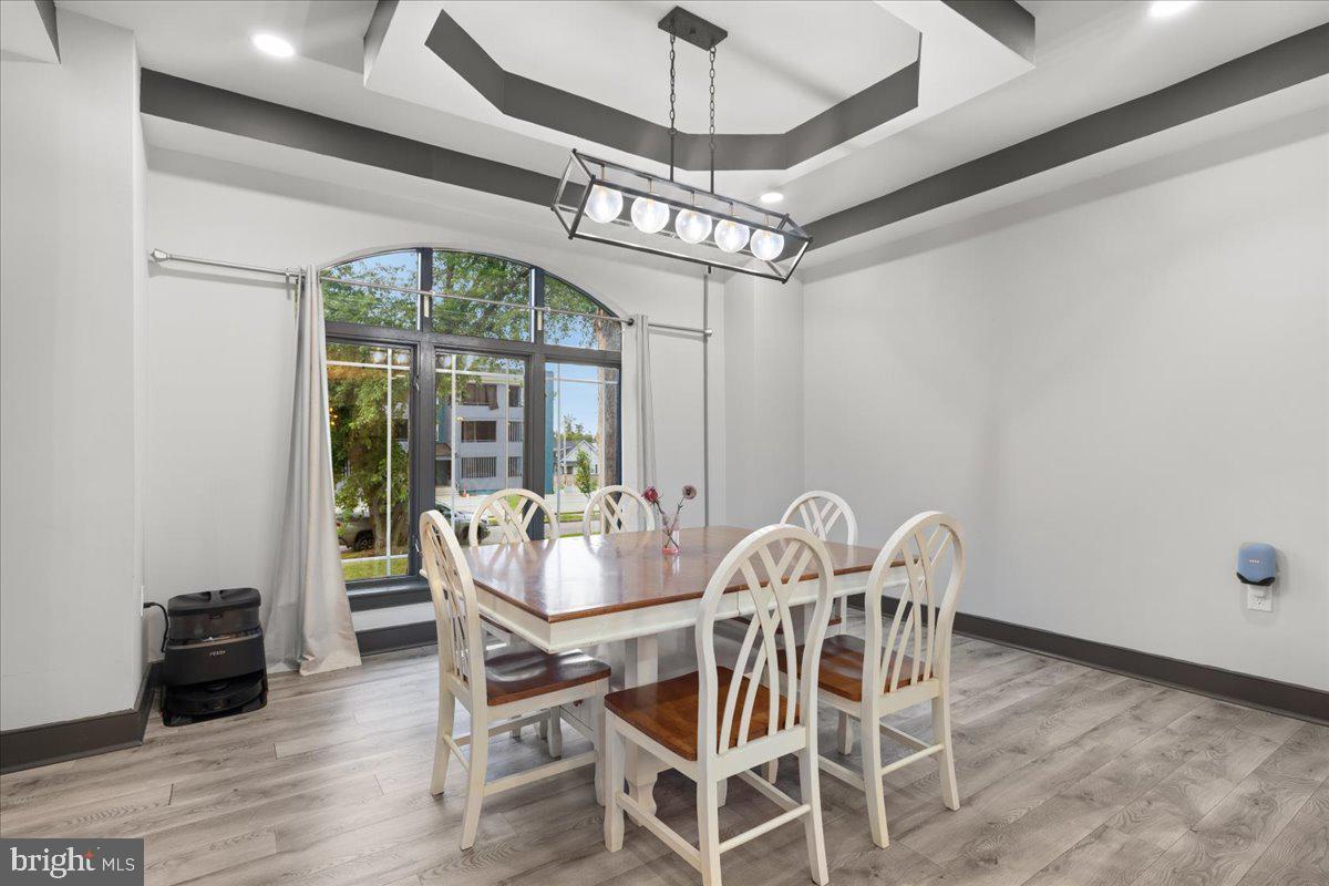 3910 Chatham Road Baltimore, MD 21207 - Photo 11 of 71 a view of a dining room with furniture window and outside view