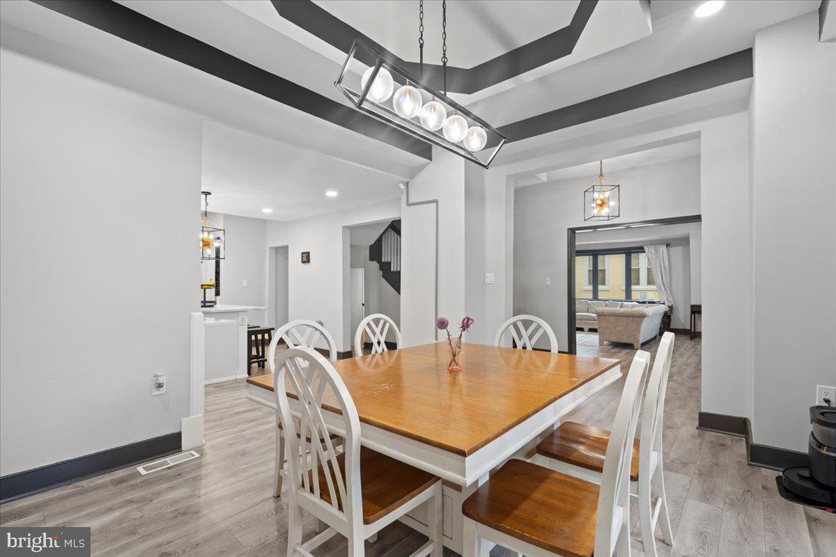 3910 Chatham Road Baltimore, MD 21207 - Photo 12 of 71 a dining room with furniture and window
