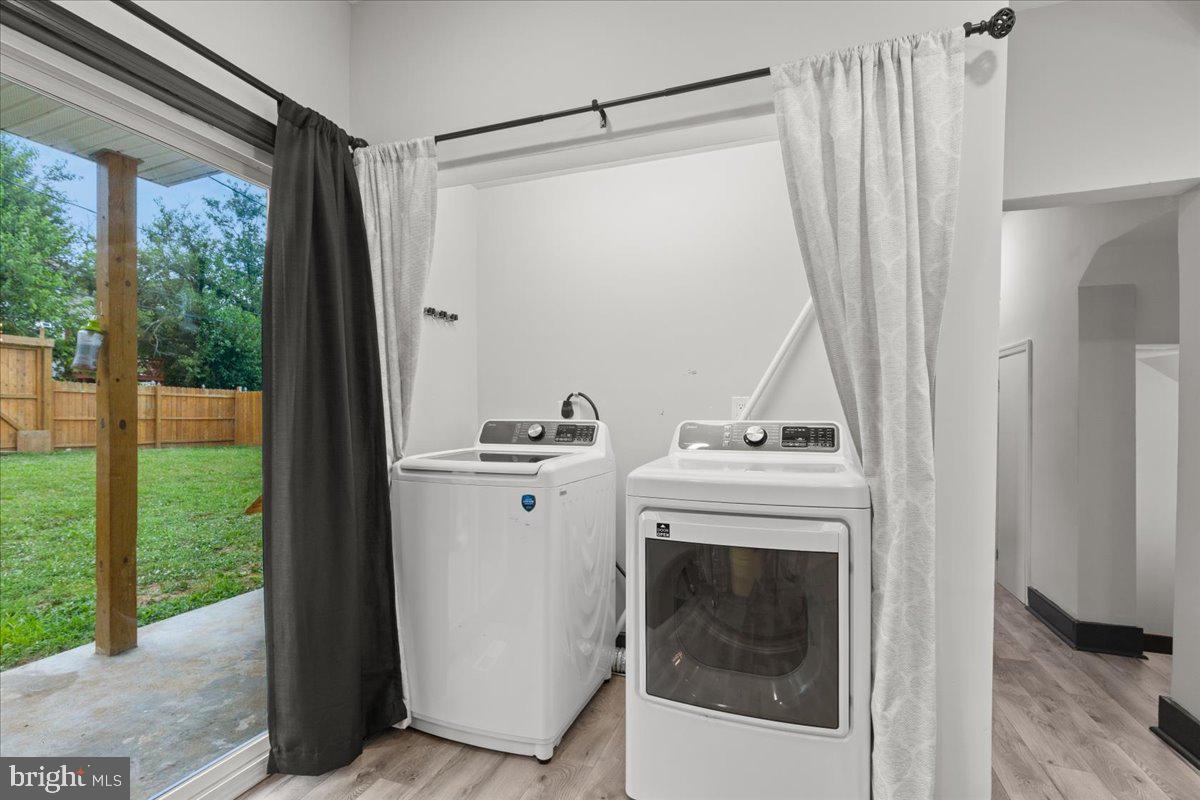 3910 Chatham Road Baltimore, MD 21207 - Photo 25 of 71 a view of a utility room with washer and dryer