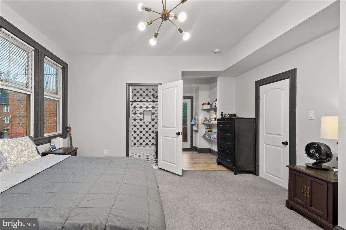 3910 Chatham Road Baltimore, MD 21207 - Photo 38 of 71 a view of a livingroom with furniture and an empty room