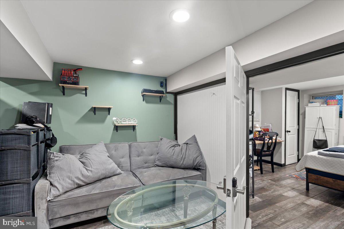 3910 Chatham Road Baltimore, MD 21207 - Photo 51 of 71 a living room with furniture and a couch