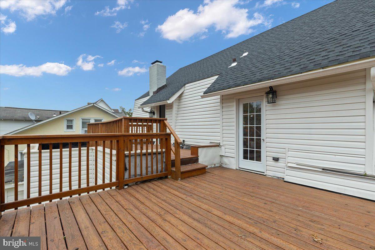 3910 Chatham Road Baltimore, MD 21207 - Photo 60 of 71 a view of a house with wooden deck