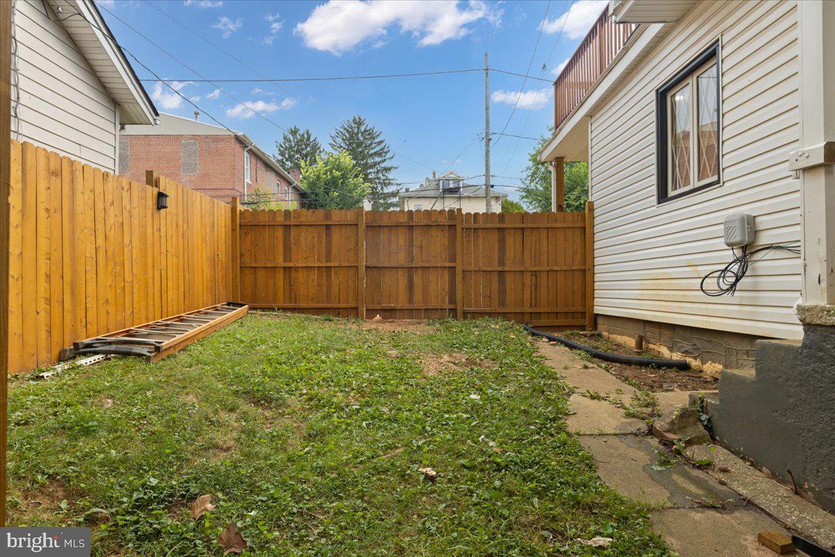 3910 Chatham Road Baltimore, MD 21207 - Photo 63 of 71 a view of a backyard with potted plants