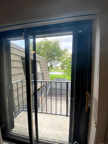 a view of entryway with a wooden floor