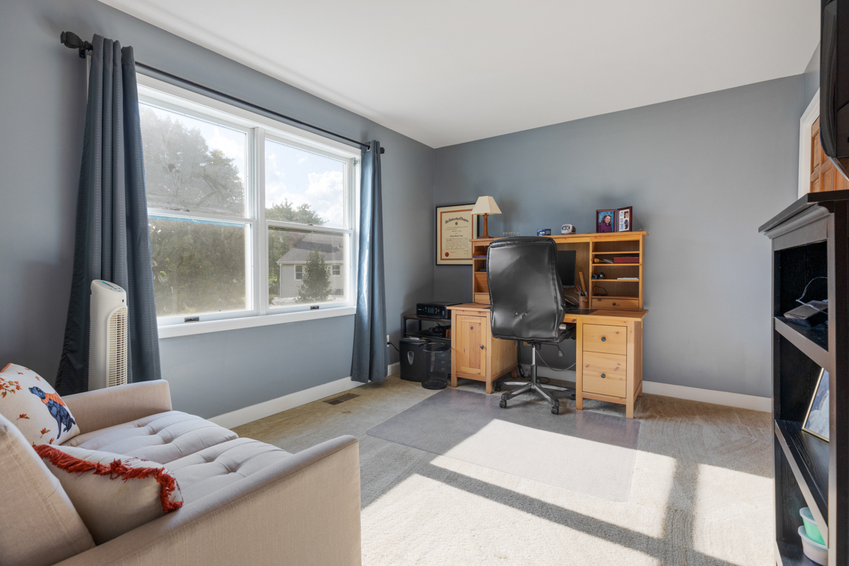 2225 Forest Ridge Road St. Charles, IL 60174 - Photo 15 of 24 a bedroom with a bed and a large window