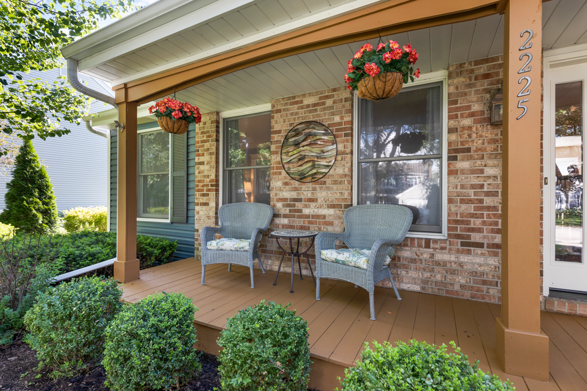 2225 Forest Ridge Road St. Charles, IL 60174 - Photo 3 of 24 a view of a patio with two chairs and a table