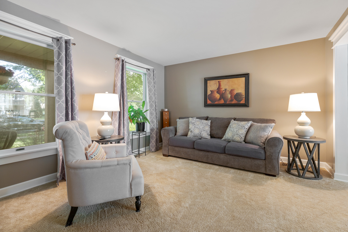 2225 Forest Ridge Road St. Charles, IL 60174 - Photo 5 of 24 a living room with furniture and a large window
