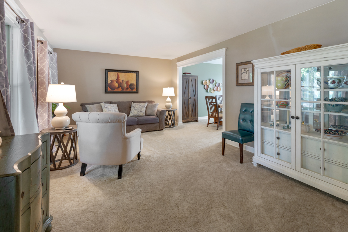 2225 Forest Ridge Road St. Charles, IL 60174 - Photo 6 of 24 a living room with furniture and a window