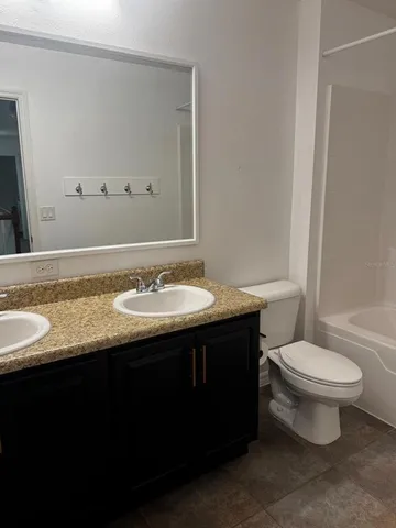 a bathroom with a sink and a toilet