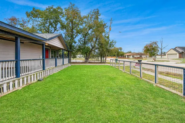 a view of a backyard with a garden
