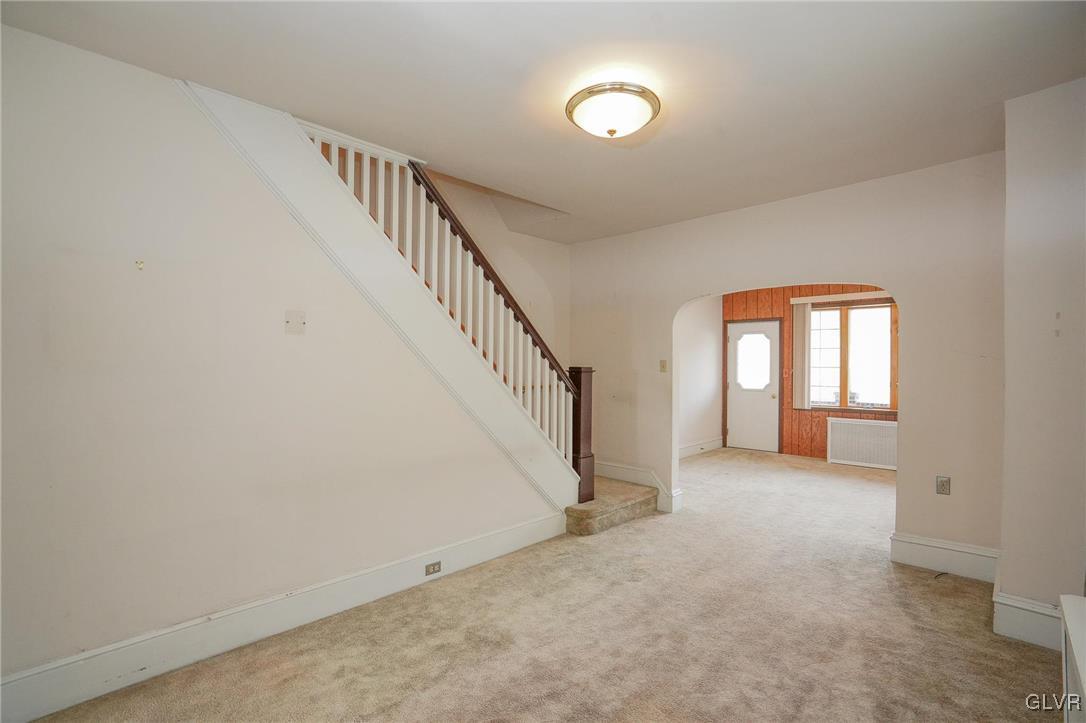 240 West Ridge Street Coaldale, PA 18218 - Photo 13 of 47 a view of a hallway with stairs