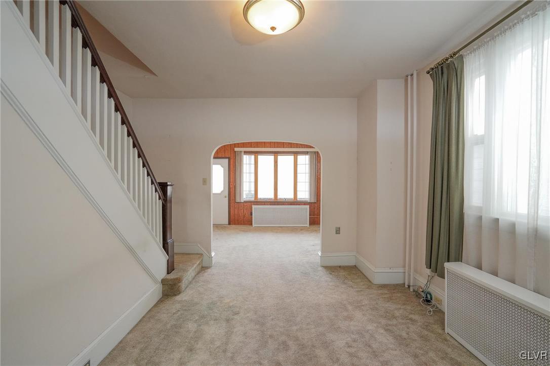 240 West Ridge Street Coaldale, PA 18218 - Photo 14 of 47 a view of a livingroom with wooden floor and window