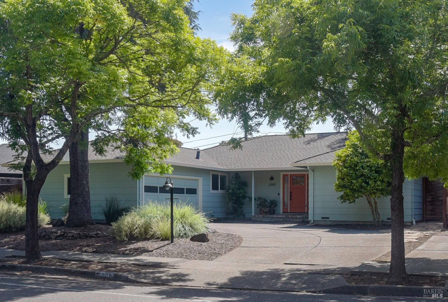 2009 Hidden Valley Drive Santa Rosa, CA 95404 - Photo 1 of 26 a front view of a house with garden
