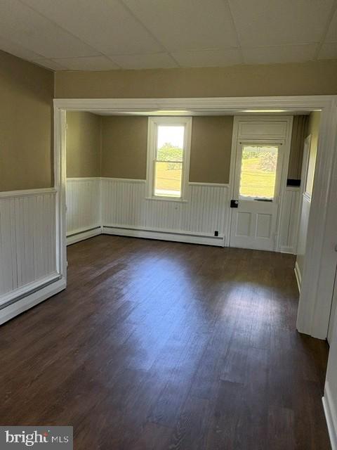 1520 Windsor Castle Road, Unit 1 Hamburg, PA 19526 - Photo 3 of 9 an empty room with wooden floor and windows