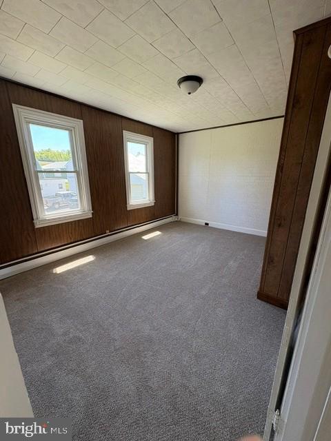 1520 Windsor Castle Road, Unit 1 Hamburg, PA 19526 - Photo 5 of 9 an empty room with windows