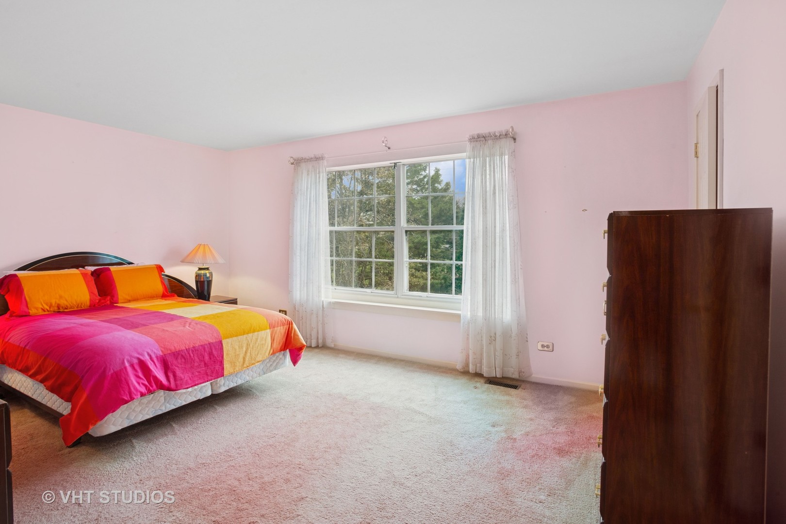 695 West Paddock Drive Wheeling, IL 60090 - Photo 11 of 18 a bedroom with a bed and wooden floor