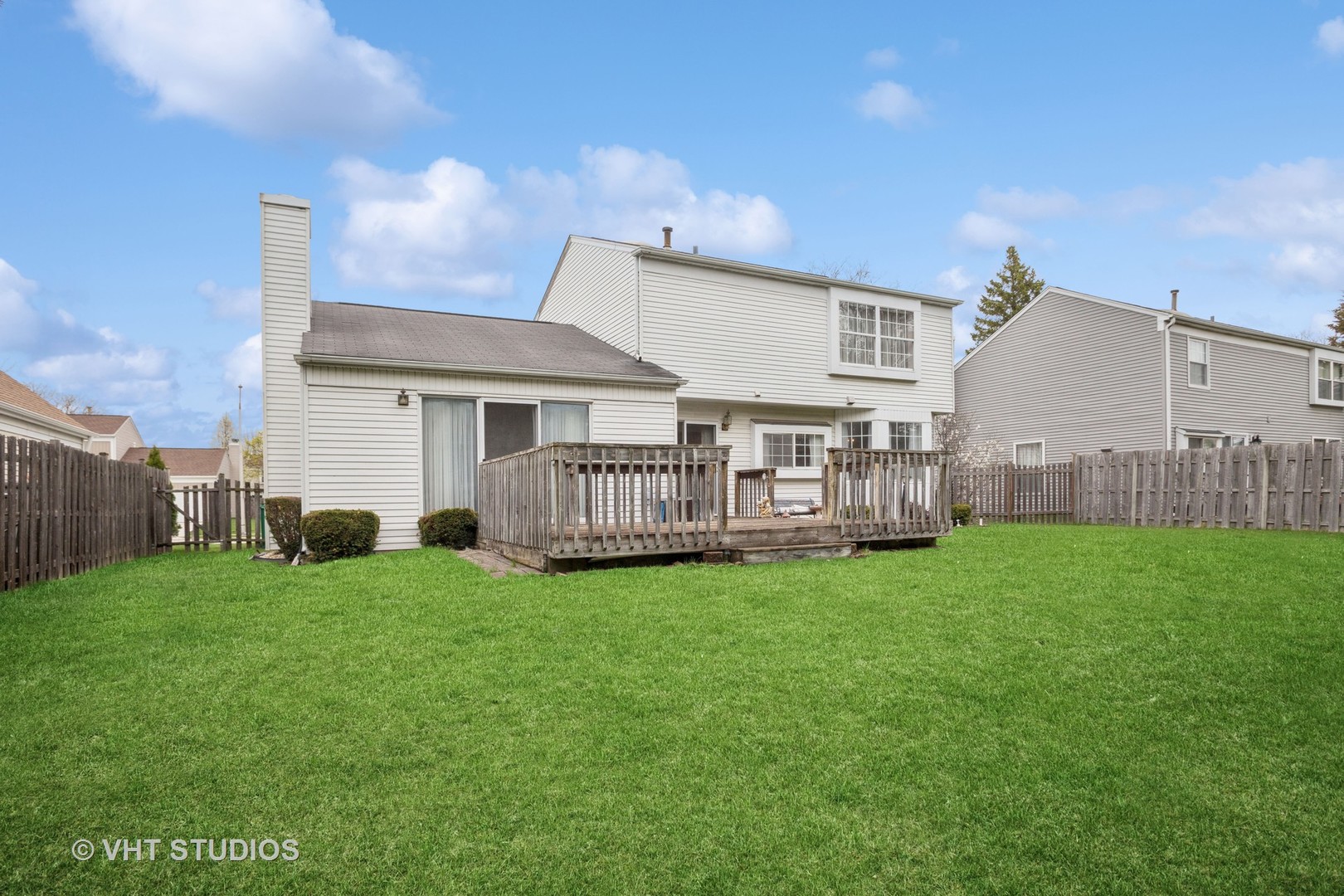 695 West Paddock Drive Wheeling, IL 60090 - Photo 16 of 18 a view of a house with a yard and sitting area