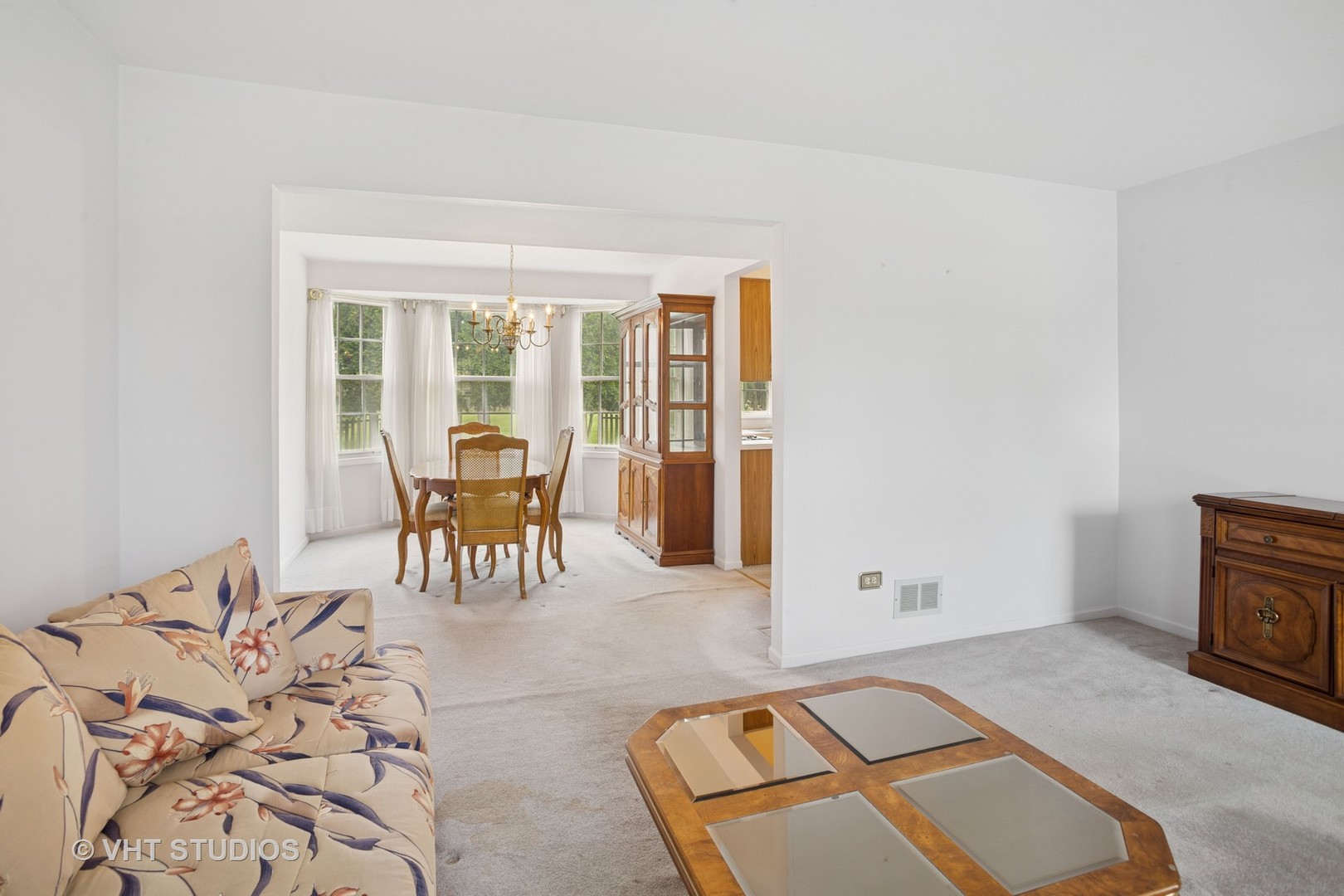 695 West Paddock Drive Wheeling, IL 60090 - Photo 3 of 18 a living room with furniture and a fireplace