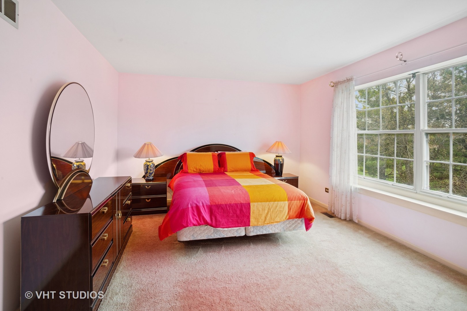 695 West Paddock Drive Wheeling, IL 60090 - Photo 10 of 18 a bedroom with a bed and a large window