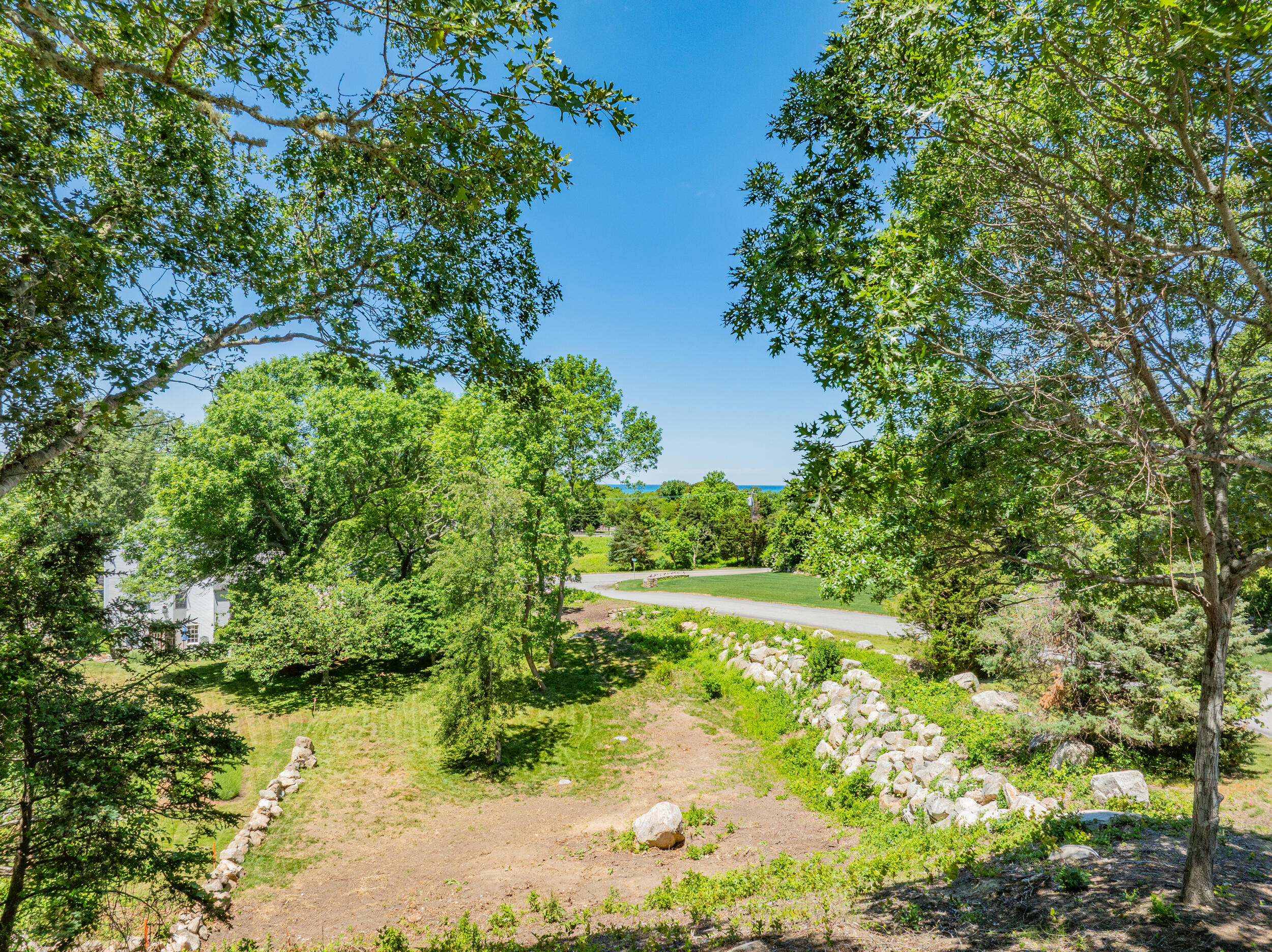 0 Ridgewood Drive Brewster, MA 02631 - Photo 3 of 42 a view of a yard with a tree