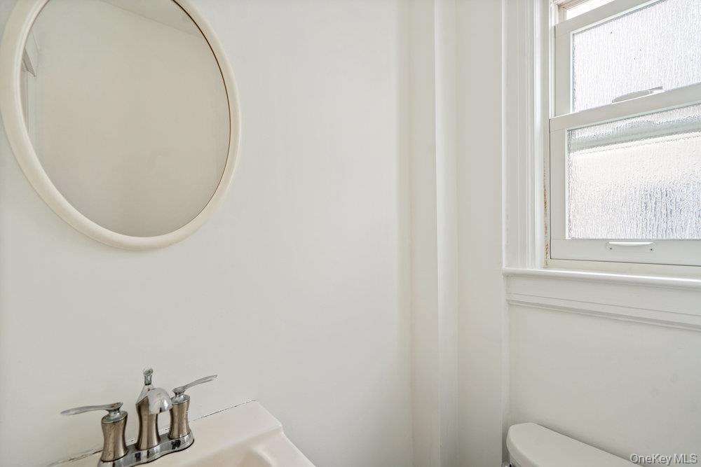 80 Munro Boulevard Valley Stream, NY 11581 - Photo 10 of 28 a view of a hallway with a mirror